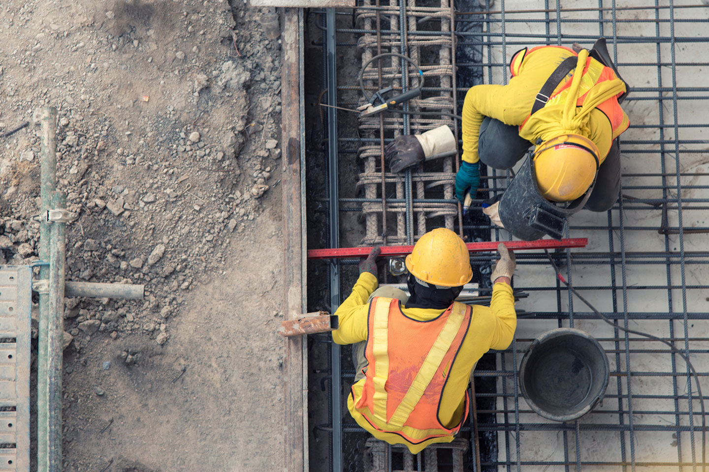 An aerial view of construction worker in construction site.